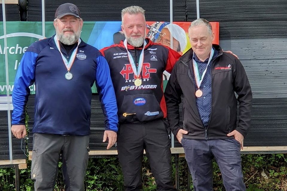 Pictured at the presentations for the Masters Compound at the Irish Open Field Championships were CúChulainn Archers members Alan Convery (1st) and Philip Fitzpatrick (3rd) with the second-place recipient.