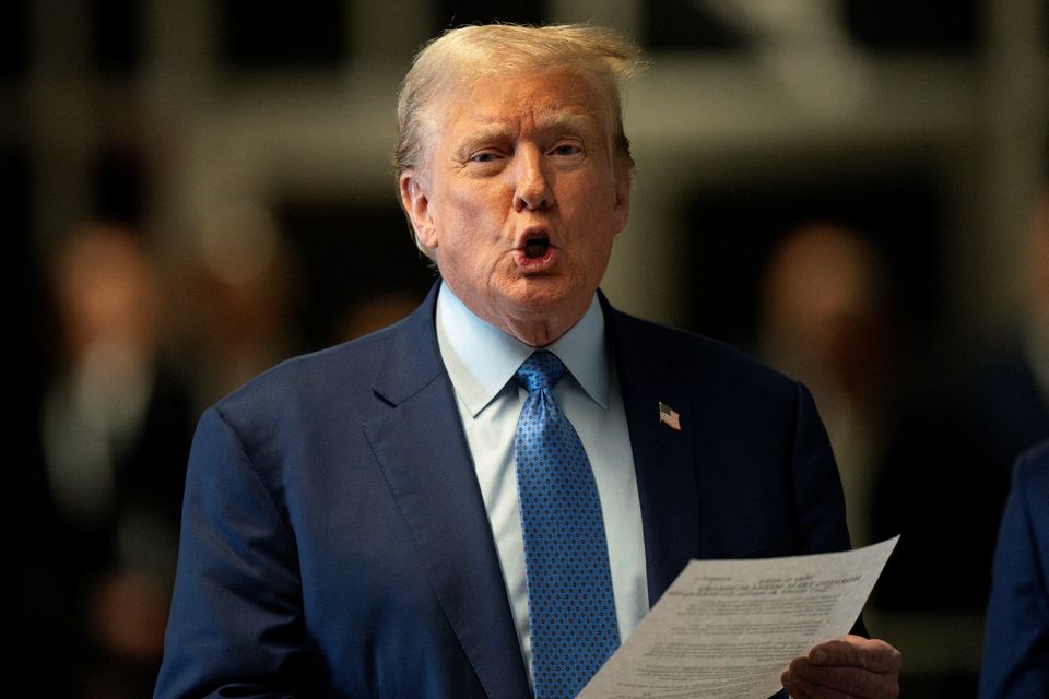 Former US president Donald Trump, who is on trial in New York City, speaks to members of the media at Manhattan Criminal Court yesterday. Photo: Reuters