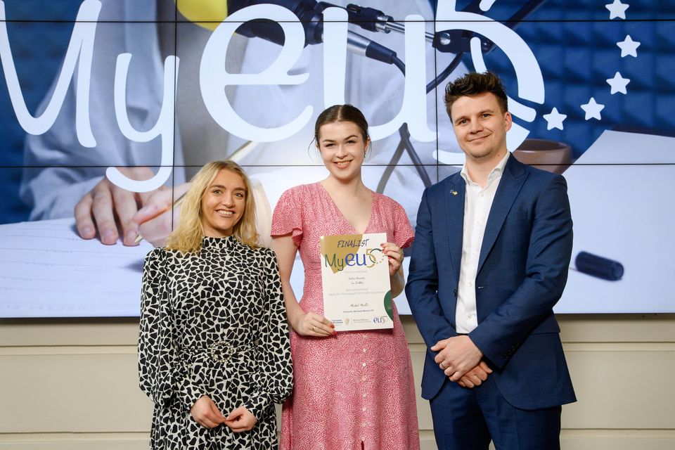 Pictured is Lettie Hessett from Enniscorthy in Wexford being presented with her MyEU50 Certificate by Ryan Levis and Gabrielle Leleu from European Movement Ireland at the competition exhibition day in University College Cork.