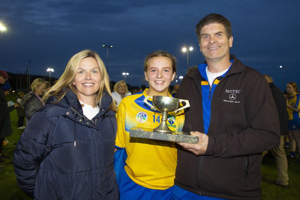 Pam, Alannah and Michael Murphy celebrate Annacurra winning the Under-14 'A' camogie championship. 
