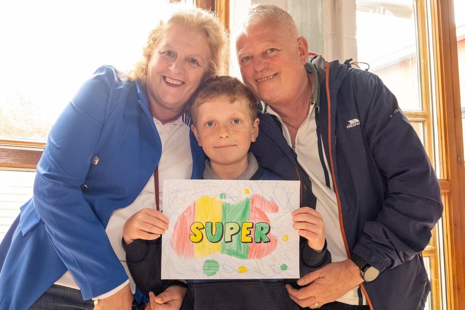 Grandparents Day At St Cronan's BNS Bray. Harry Doyle with grandparents Tricia and Billy Mooney