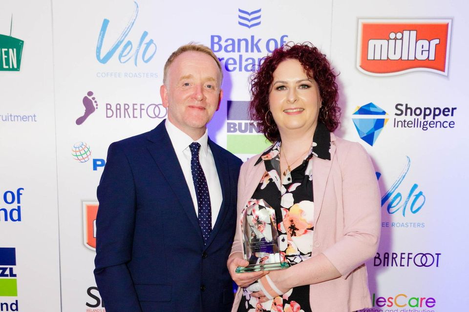 Mark Morgan, account manager, ShelfLife magazine, presents the In-Store Bakery Manager of the Year Award to Sinead Dodd, Pettitt's SuperValu, Bray at the ShelfLife Grocery Management Awards 2023. Photo: Joe Keogh
