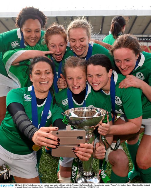 Tania Rosser (bottom left) and her Ireland team-mates celebrate with the Women's Six Nations Rugby Championship trophy