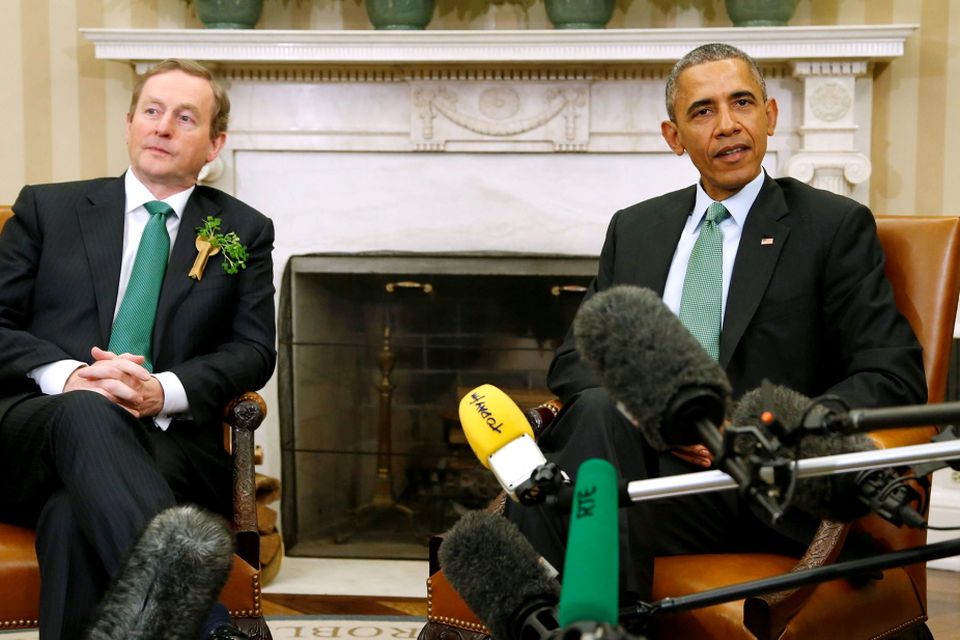 U.S. President Barack Obama (R) and Ireland's Prime Minister Enda Kenny speak to reporters after their meeting in the Oval Office as part of a St. Patrick's Day visit at the White House in Washington March 17, 2015. REUTERS/Jonathan Ernst
