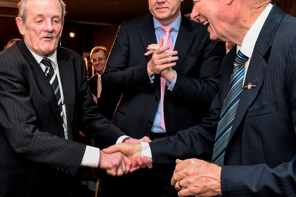 22 December 2014; Former Dublin player Jimmy Keaveney is congradulated by former RTE commentor, Micheal O Muircheartaigh on his way to be presented with the  Hall of Fame award during the Croke Park Hotel / Irish Independent Sportstar of the Year Luncheon 2014. The Westbury Hotel, Dublin. Picture credit: David Maher / SPORTSFILE