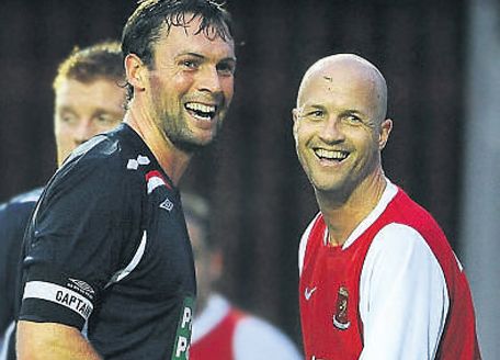 Jamie Harris of St Pat's shares a joke with Valletta's Jordi Cruyff during last night's Europa League clash at Richmond Park