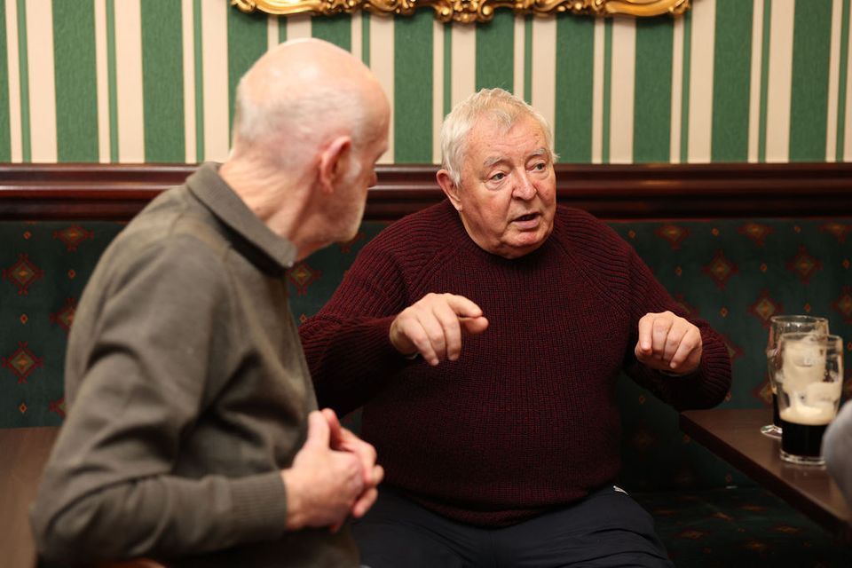 Former dock workers Paddy Nevins and John 'Miley' Walsh reminisce over a pint