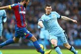 thumbnail: Manchester City's James Milner is challenged by Crystal Palace midfielder Joe Ledley during their Premier League clash at the Etihad. Photo: Michael Steele/Getty Images