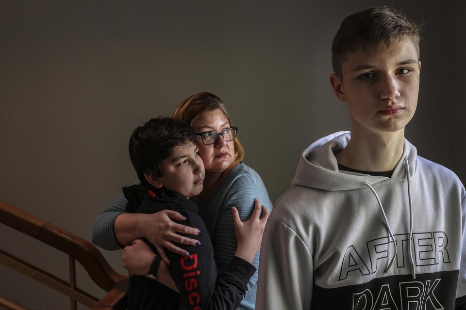 Ivan Kozakov, (16), his brother, Timotiy, (14), and their mother, Olena, from Ukraine, who have travelled to Cork. Picture by David Conachy