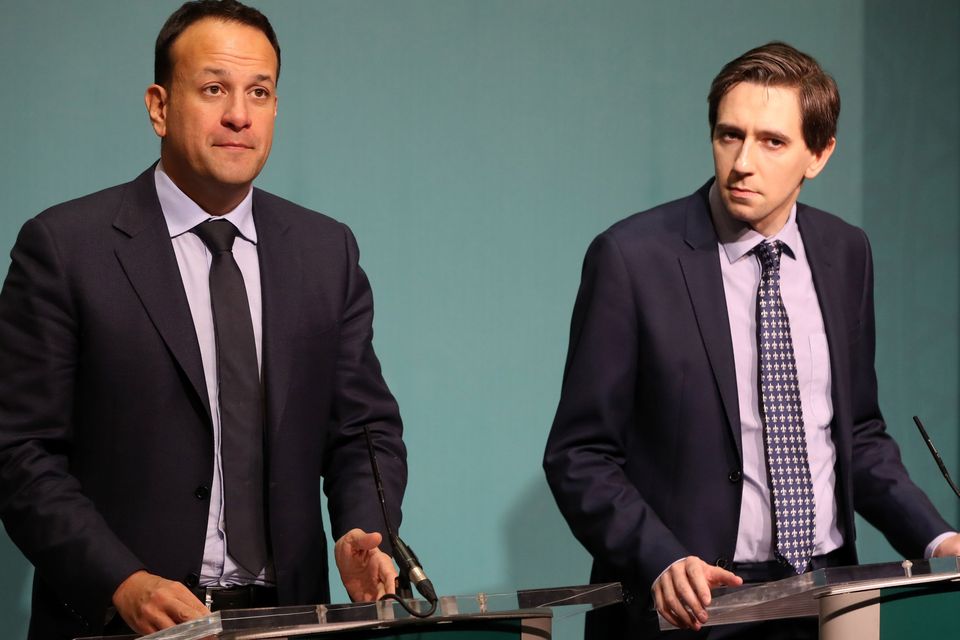 Taoiseach Leo Varadkar, left, and Minister for Health Simon Harris (Niall Carson/PA)
