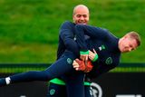 thumbnail: Darren Randolph gives James McClean a lift during training in Abbotstown