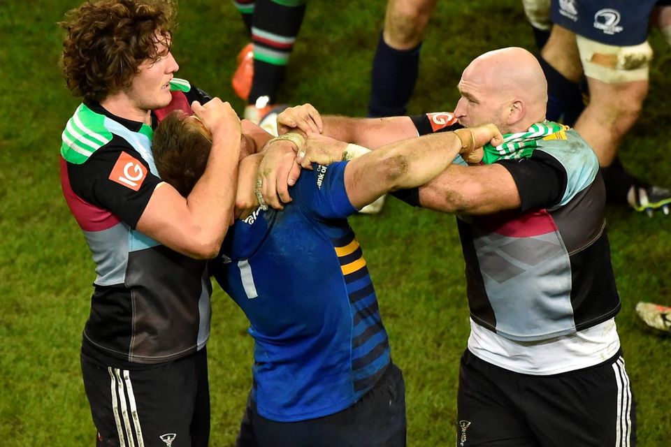 Dominic Ryan is the meat in the sandwich as Harlequins pair Charlie Mathews and George Robson grab hold of the Leinster flanker during their European Rugby Champions Cup clash at the Aviva Stadium. Photo: Barry Cregg / SPORTSFILE