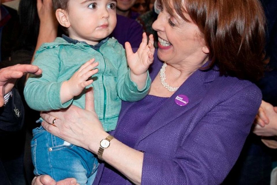 Róisín Shortall of the left-leaning Social Democrats, who topped the poll in Dublin North West, celebrates with grand nephew Dara Baxter (2) at the count centre in Dublin’s RDS. Photo: Collins Dublin, Gareth Chaney