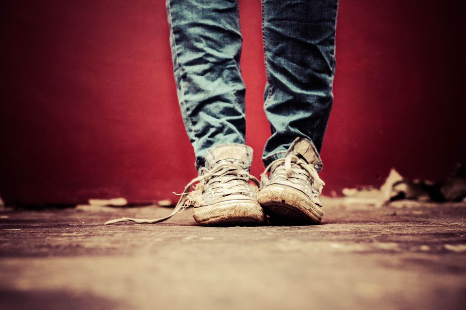 Wearing your sneakers or shoes until they're ready for the trash is one way to contribute to the core of underconsumption and help the environment. Photo: Stock/Getty