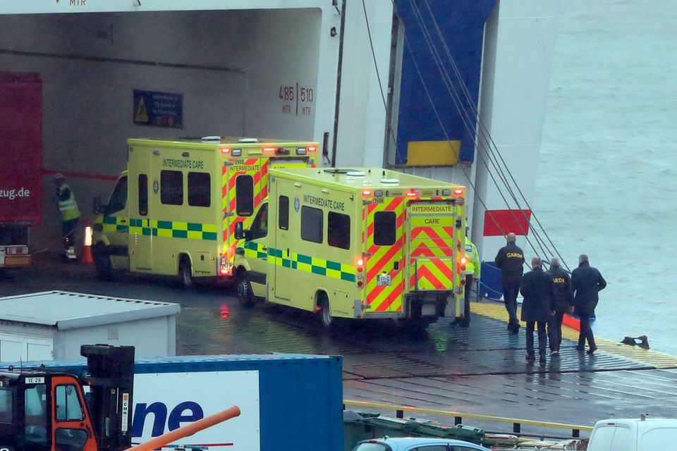 First aid: Emergency personnel at Rosslare Europort board the ferry after 16 people were discovered in a sealed trailer. Photo: Niall Carson/PA Wire