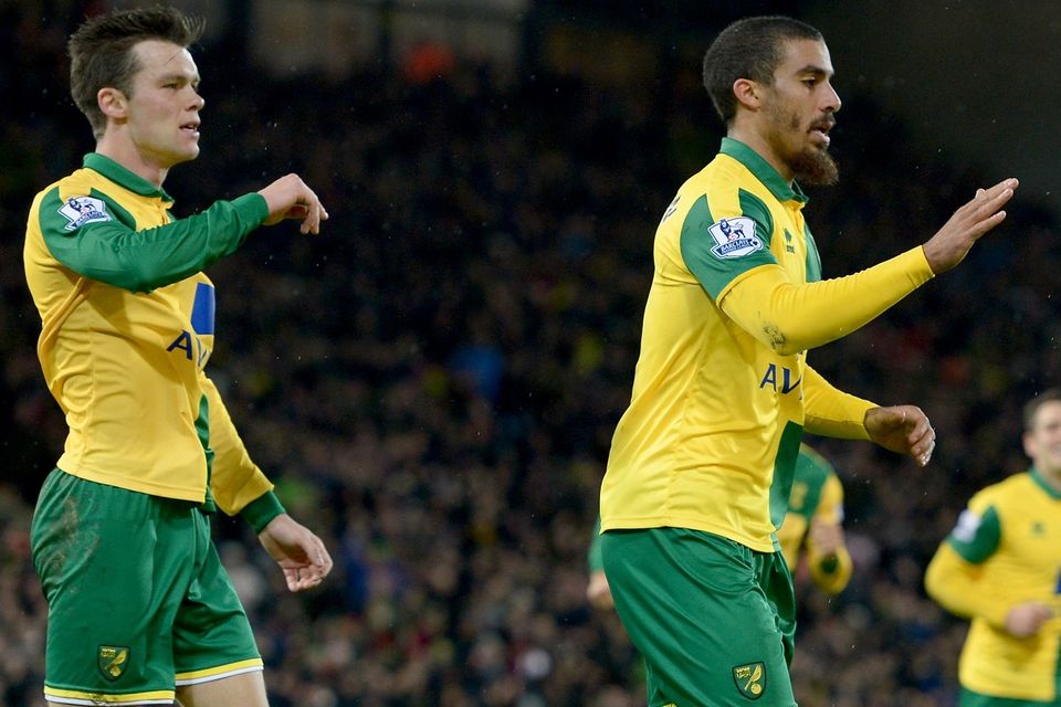 Lewis Grabban, pictured right, scored on his return to the Norwich side on Sunday
