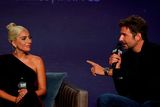 thumbnail: Director and actor Bradley Cooper speaks with actor and singer Lady Gaga during the press conference to promote the film A Star is Born at the Toronto International Film Festival (TIFF) in Toronto, Ontario, Canada, September 9, 2018.  REUTERS/Mario Anzuoni