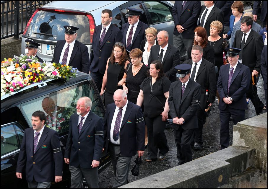 The remains of Larry and Martina Hayes tragically killed in Tunisia cross the Shannon to arrive at the Church of St Peter and Paul where the funeral mass will take.
Pic Steve Humphreys
2nd July 2015.