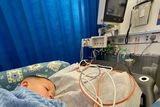 thumbnail: Parker being treated for his wounds in the aftermath of the attack