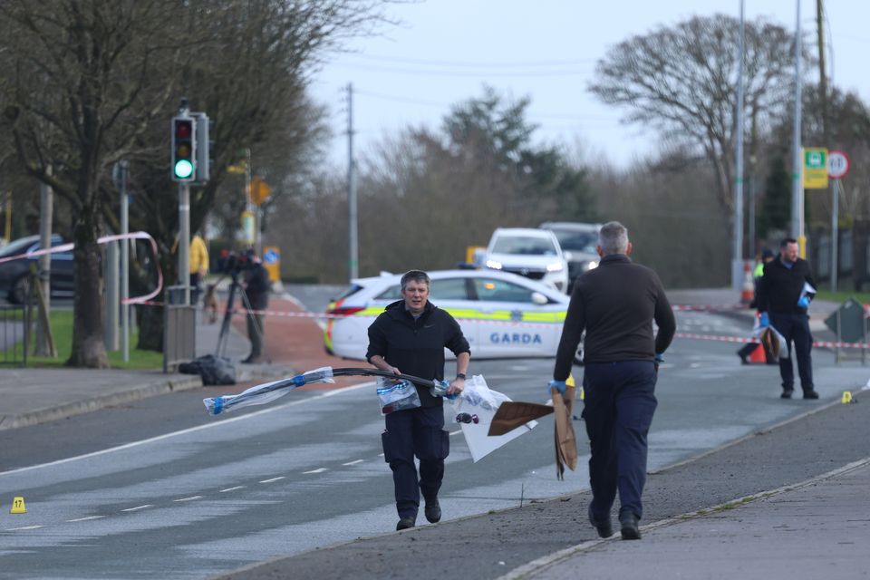 Garda forensic collision officers at the scene of the accident on the Slane Road, Navan, Co Meath. Photo: Collins