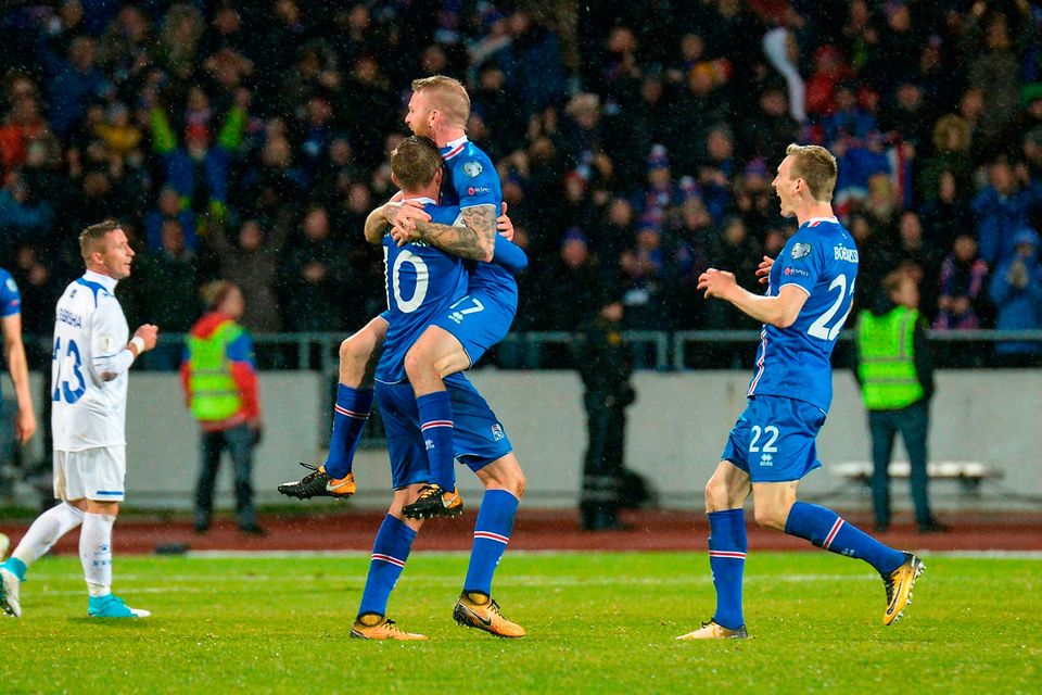Iceland midfielders Gylfi Sigurdsson and Aron Gunnarsson celebate. Photo: Getty