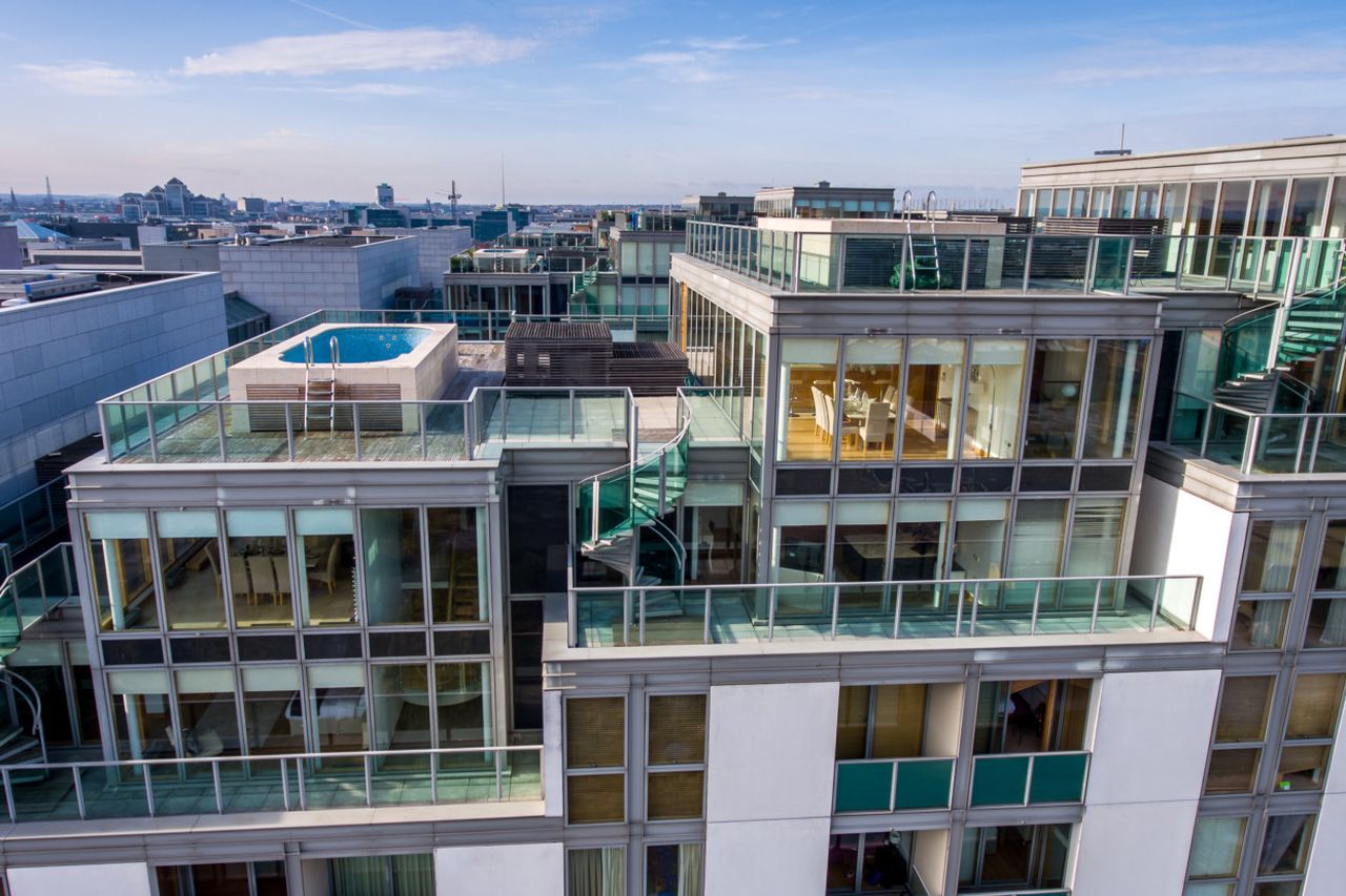 Image showcasing 13 luxurious penthouses in Singapore with breathtaking views