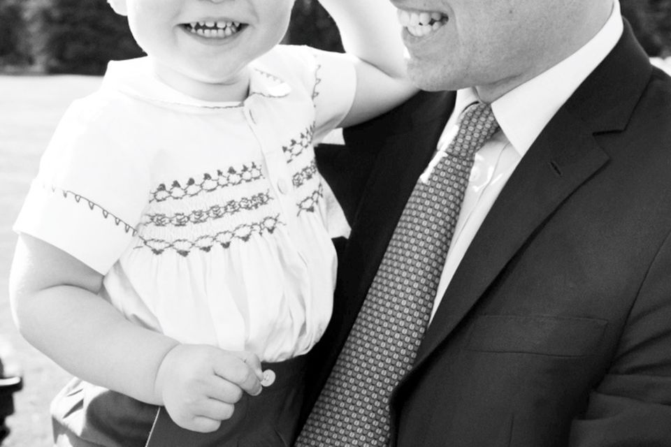 The Duke of Cambridge and his son, Prince George, after the christening of Princess Charlotte of Cambridge at Sandringham on Sunday Photo: Mario Testino / Art Partner