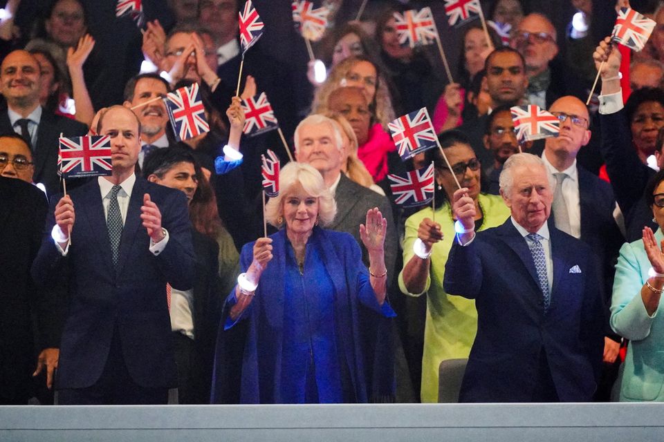 The Prince of Wales, King Charles III and Queen Camilla in the Royal Box viewing the Coronation Concert held in the grounds of Windsor Castle, Berkshire, to celebrate the coronation of King Charles III and Queen Camilla. Picture date: Sunday May 7, 2023.  Yui Mok/Pool via REUTERS