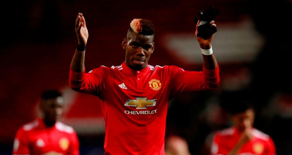 Manchester United's Paul Pogba under fire from Paul Scholes. Action Images via Reuters/Jason Cairnduff