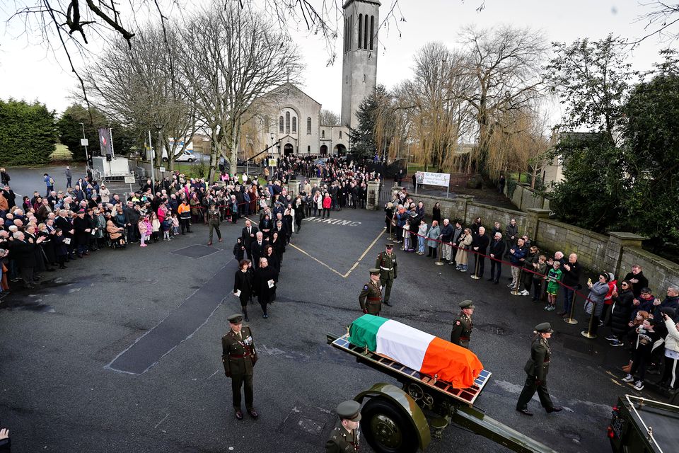 The remains of former taoiseach John Bruton are taken from Saint Peter and Paul’s Church in Dunboyne following his funeral mass.  Picture by Gerry Mooney