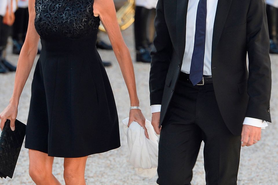 French Minister of Economy Emmanuel Macron (R) and wife Brigitte Trogneux arrive for the State Dinner Offered By French President Fran?ois Hollande at the Elysee Palace on June 2, 2015 in Paris, France.  (Photo by Pascal Le Segretain/Getty Images)