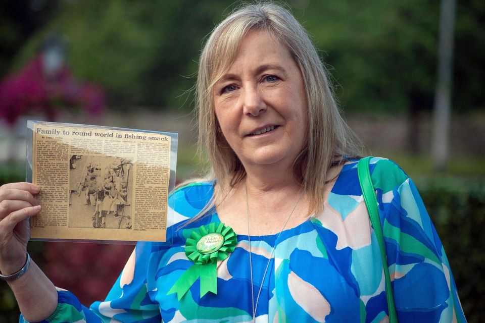 Peel Whillock from Killarney and originally the UK, who arrived in Ireland 50 years ago when their family boat got ship wrecked in Cork pictured at the Citizenship Ceremonies Day 2 at the INEC, Killarney on Tuesday. Peel, (called after the port on Manx Island) holds a copy of the newspaper article from the time the family arrived in Cork. Photo: Don MacMonagle