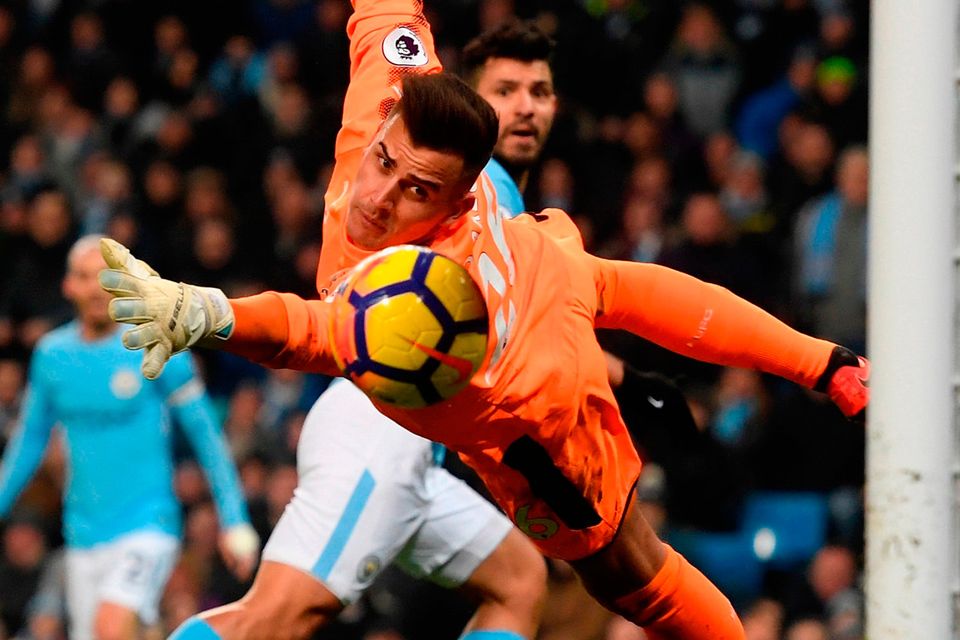Sergio Aguero beats Newcastle goalkeeper Karl Darlow with the faintest of touches to score Manchester City’s first goal. Photo by Stu Forster/Getty Images