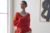 thumbnail: By Malene Birger 'Cimone' orange sweater, €300; 'Pilavis' satin top, €250, ecrustudios.com
