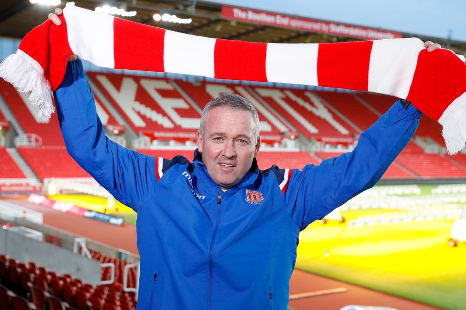 Paul Lambert poses with a Stoke scarf