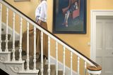 thumbnail: The staircase showcases some family portraits, including one of Aisling’s mother-in-law Judy, and one of Yseult by Sam Horler.