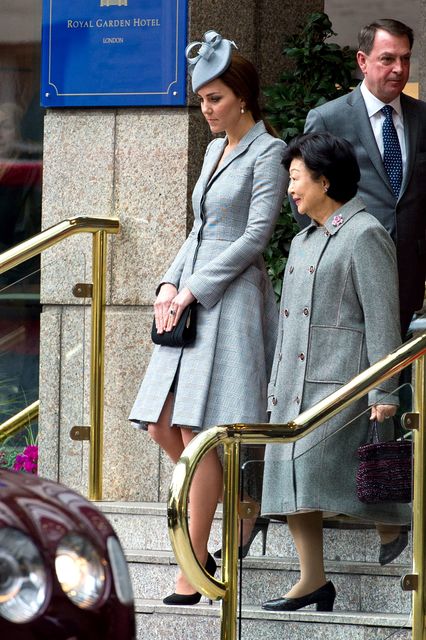 (L-R) Catherine, Duchess of Cambridge and Mary Tan depart the Royal Garden Hotel