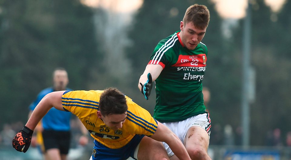 Roscommon's John McManus in action against Mayo's Conor OShea. Photo:  Ramsey Cardy/Sportsfile