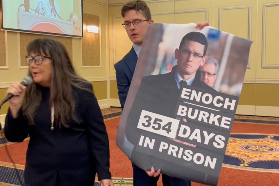 Martina and Josiah Burke protest at the Church of Ireland synod in Armagh.