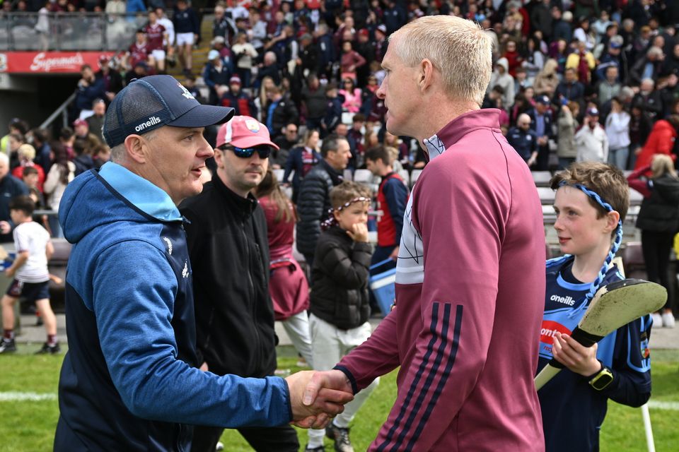 Micheál Donoghue shakes hands with Henry Shefflin after their Leinster SHC match. Photo: Daire Brennan/Sportsfile