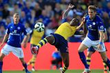 thumbnail: Leicester City's Dean Hammond (right) pulls back Arsenal's Yaya Sanogo (centre)