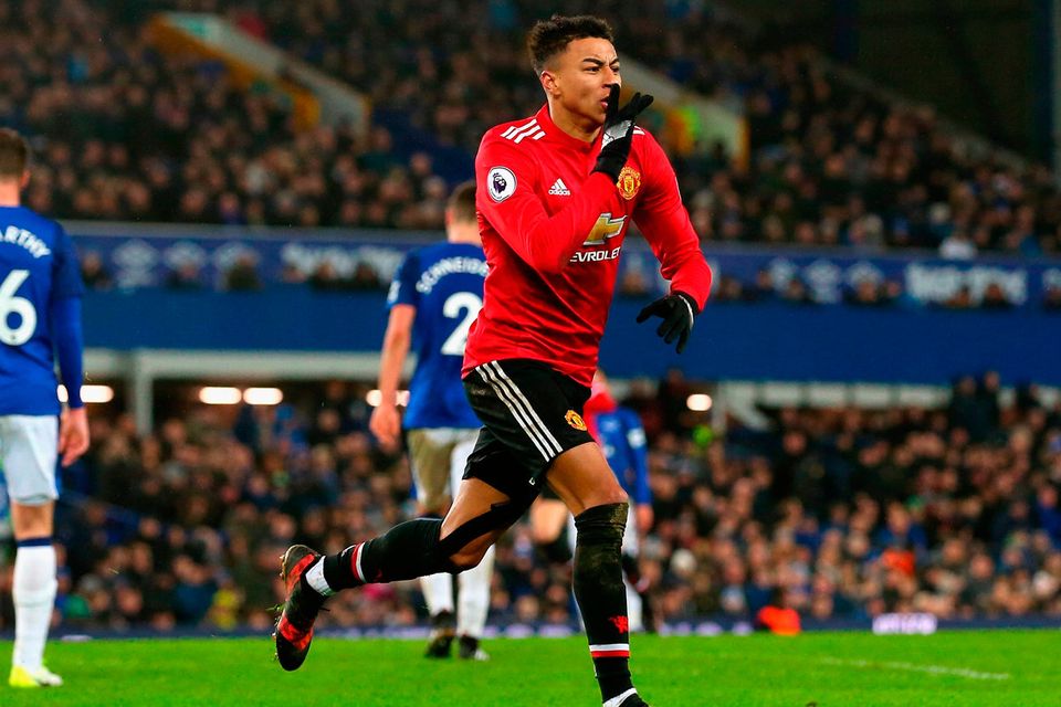 James McCarthy is all alone with his thoughts as Jesse Lingard celebrates after scoring Manchester United’s second goal at Goodison Park. Photo: Getty Images