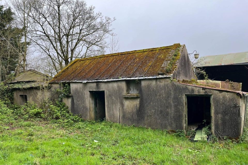 The property comes with a number of outbuildings. 