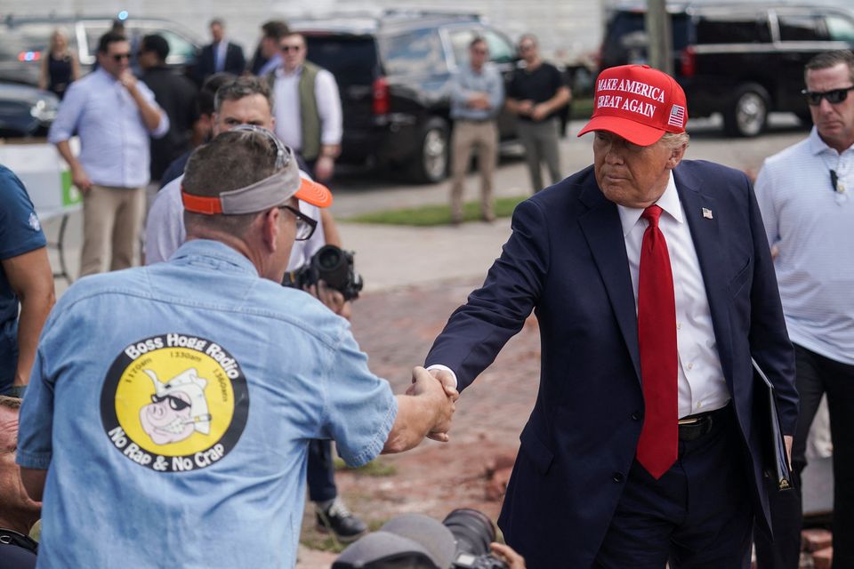 Biden hits back after Trump lies about his response as Hurricane Helene death toll passes 100