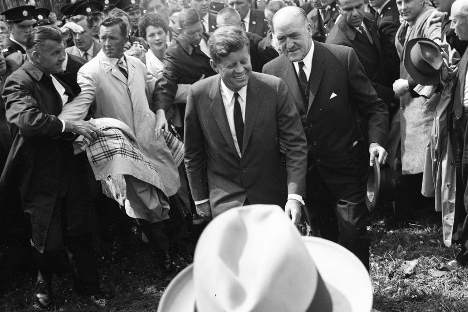 American President John Fitzgerald Kennedy (J.F.K)'s visit to Ireland, June 1963. JFK walking with a smile amongst crowd.
(Part of the Independent Ireland Newspapers/NLI Collection)