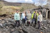 thumbnail: Pieter Bot with his daughters Wendy, Lonneke, and Linda and granddaughter Lily-Mae at the site of their family home which burnt to the ground on Good Friday. All that remains on the site are the partial walls of the workshop also on the site. The house is completely gone. Photo by Michael Donnelly.