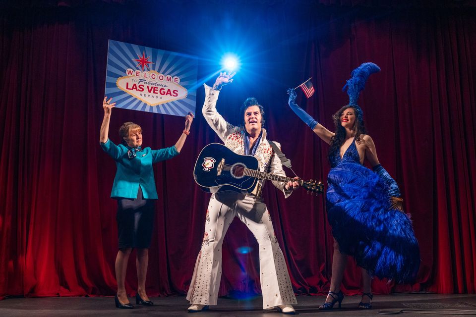 Elvis Presley impersonator Ciarán Houlihan with Aer Lingus cabin crew members Wendy Seong and Dave Kennedy. Photo: Naoise Culhane