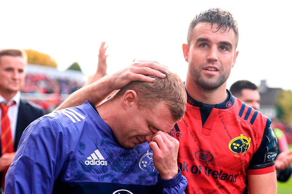 Conor Murray offers a comforting hand to Keith Earls, who was sent off during Saturday’s game for a tip tackle DIARMUID GREENE/SPORTSFILE