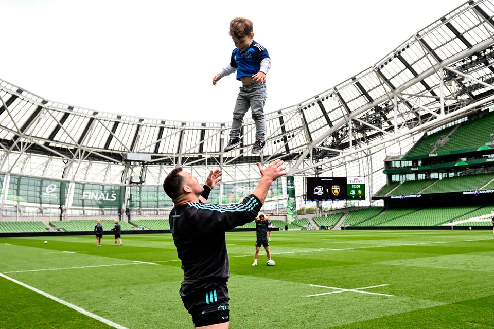 Cian Healy and his son Beau during yesterday's captain's run at the Aviva Stadium. Photo: Harry Murphy/Sportsfile