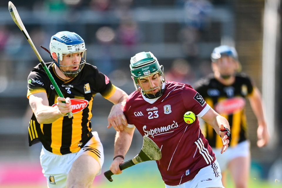 Galway's Evan Niland in control as Kilkenny's Huw Lawlor tries to stop him at Pearse Stadium. Photo: Sportsfile